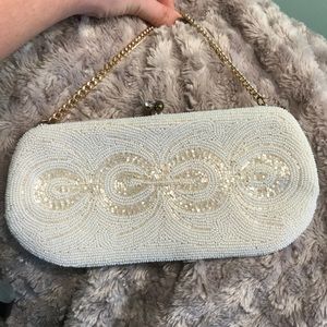 Lovely cream and white beaded clutch